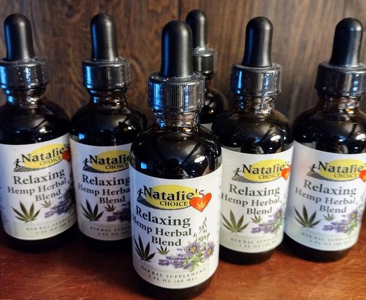 6 relaxing herbal tincture bottles lined up with Natalieschoice logo.