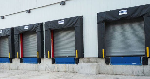 4 bays of a loading dock with doors closed