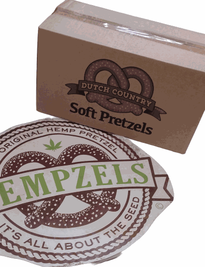 2oz Soft Hempzel(tm) Pretzel Rods or Stix without salt lined up with a single one in front.