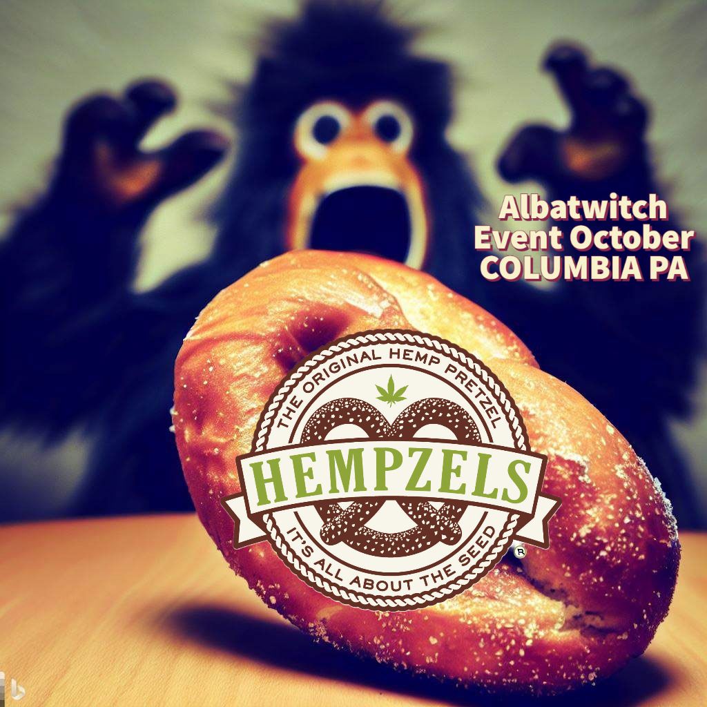 background image of a monster an albatwitch over a soft pretzel with a Hempzels logo on it.