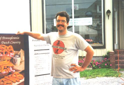 Shawn House standing in front of the Original office of Hempzels on main street in Blue Ball, PA