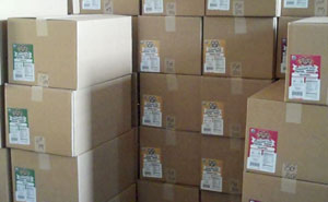 Boxes of Soudough Hemp Pretzels stacked up around 15 cases