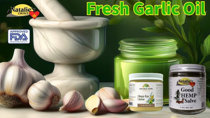 2 whole garlic bulbs and split cloves in the middle highlighting the benefits