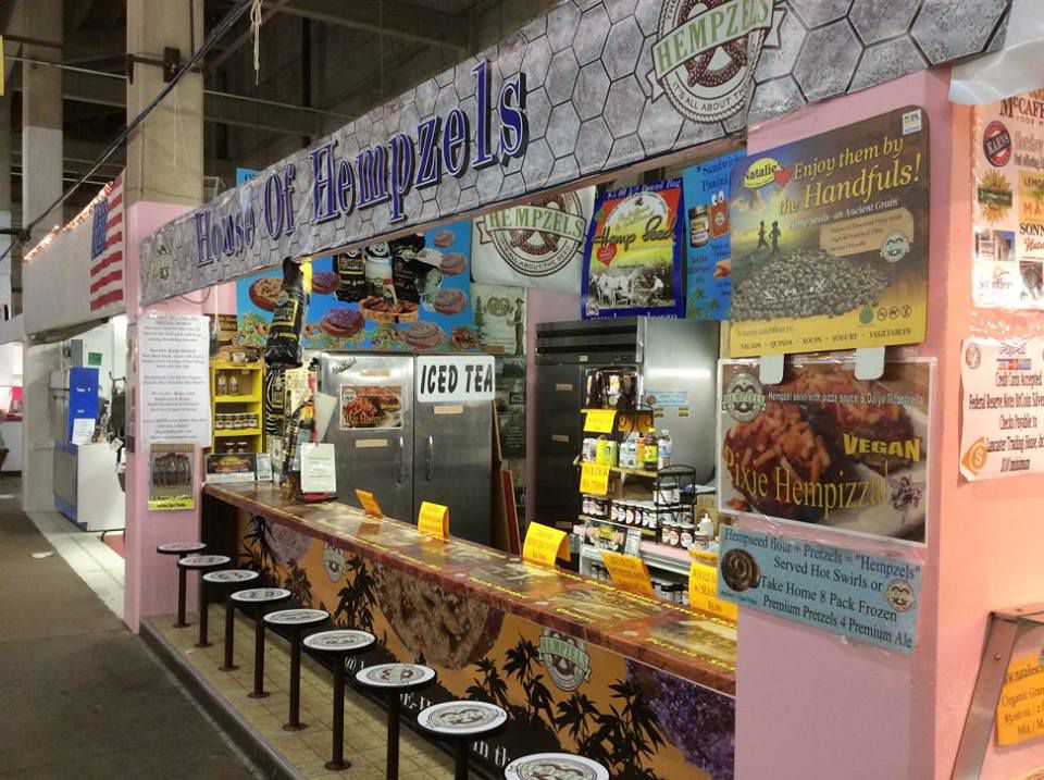 Bright pink corner booth at the york fair, 12 round Hempzel seats, counter top & ready for business.