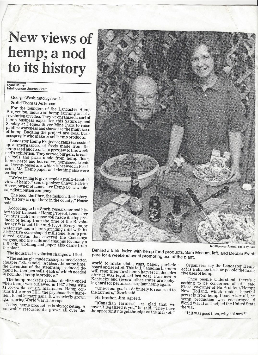 Black & White newpaper with photograph of woman Debbie Franz standing next to husband with hemp foods.
